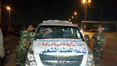 صورة انطلاق قافلة مساعدات من البصرة لدعم متطوعي الحشد الشعبي في جبهات القتال