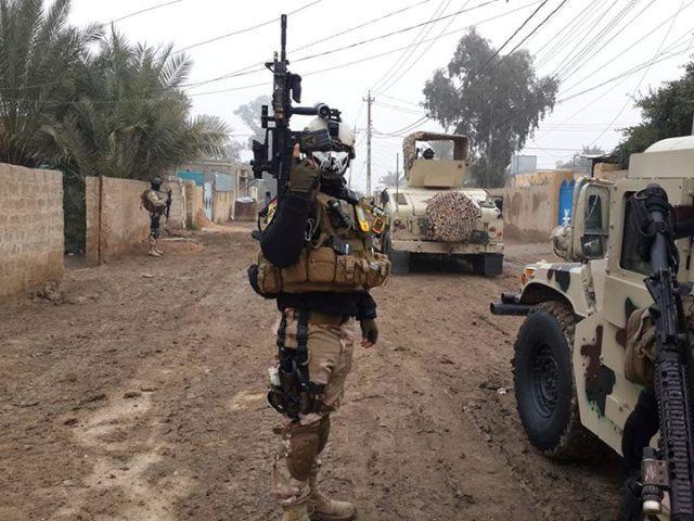 صورة القوات الأمنية العراقية تبدأ عملية تحرير منطقة الملعب بالرمادي
