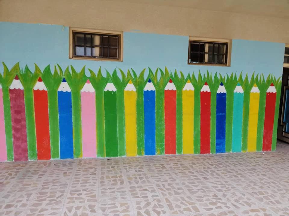 صورة جدران مدرسة تتحول الى لوحات فنية في كربلاء المقدسة (صور)
