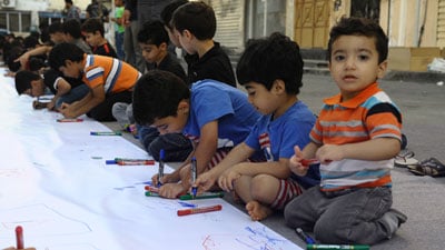 250 children in Bahrain participate in drawing board about Imam Hussain