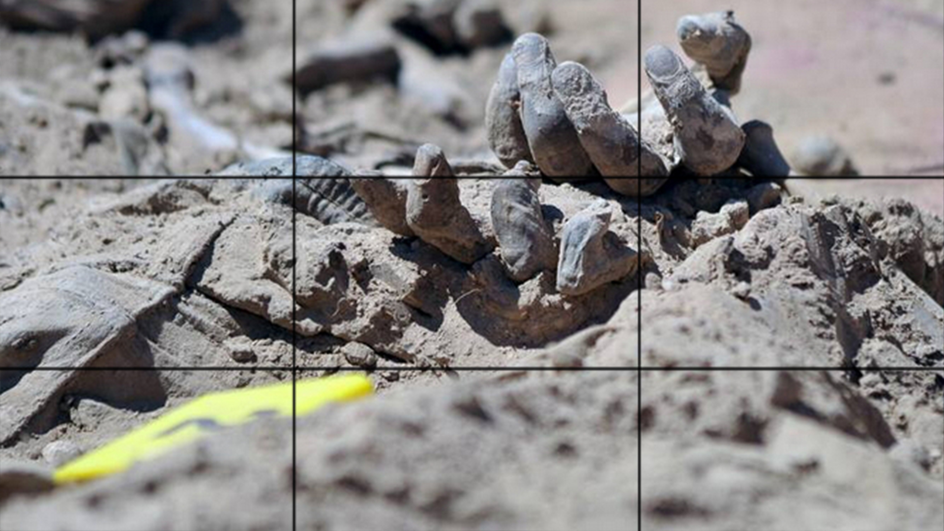 Photo of Mass grave containing 470 bodies of Speicher Base found in Tikrit