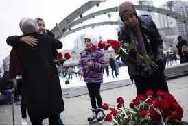 Photo of Canadian Muslim women hand out roses as a thank-you for Toronto’s support