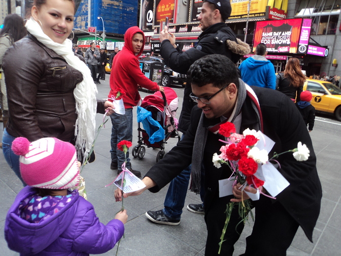 Photo of Muslim students in Canada hand out roses during Islam awareness week