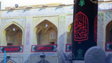 Photo of Black banners spread around the Holy Shrine of Imam Ali on the martyrdom anniversary of Lady Fatima al-Zahra