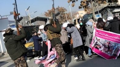 Photo of Taliban fighters pepper spray women protesters calling for rights