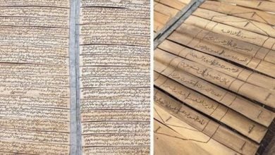 Photo of Copy of Noble Quran written on palm fronds displayed in UAE