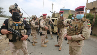 Photo of Three Iraqi soldiers killed by a roadside bomb