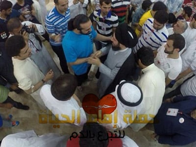 تصویر طرح اهداي خون در روز ميلاد امام حسين عليه السلام در کویت