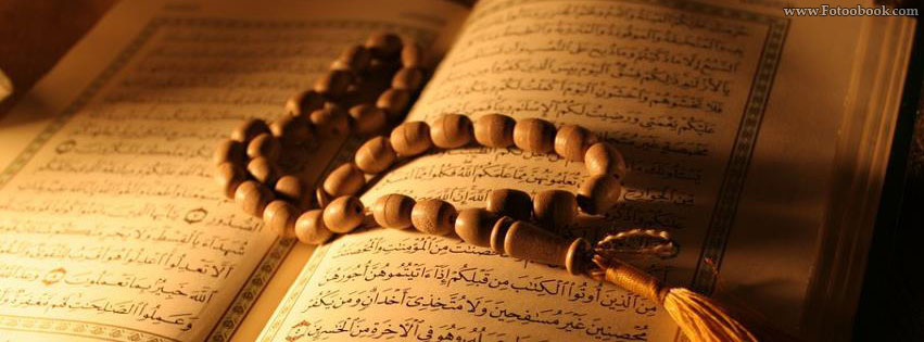 تصویر توزیع نسخه هایی از قرآن در بین انجمن ها و مراکز حفظ قرآن کشور گینه