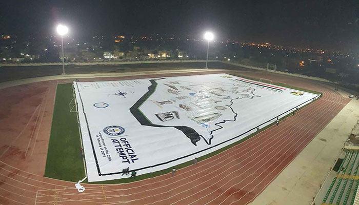 تصویر ثبت رسمى بزرگترین پوستر جهان متعلق به آستان حسینی در گینس