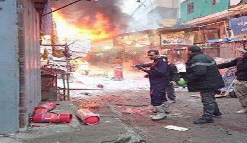 تصویر ده ها کشته و زخمی در دو انفجار در بازاری در مرکز بغداد
