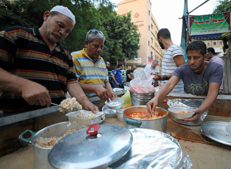 تصویر سفره افطار مشترک مسیحیان و مسلمانان در مصر