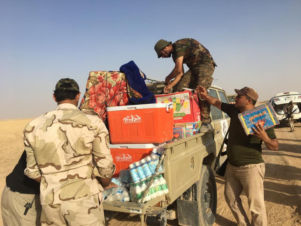 تصویر ارسال کمک های آستان مقدس عباسی به نیروهای مردمی