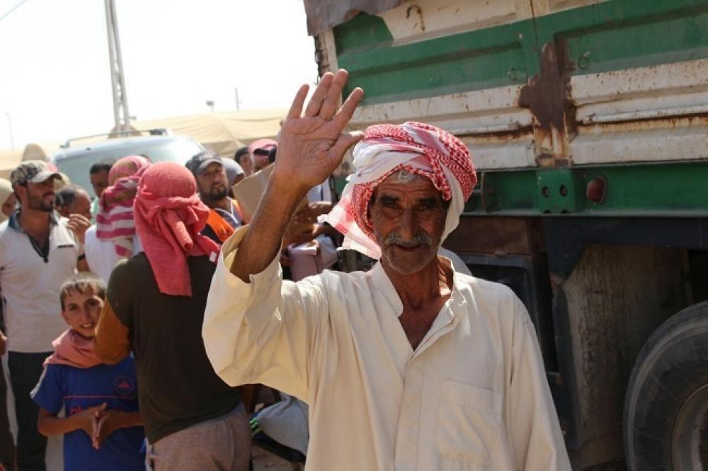 تصویر بازگشت آوارگان عراق به موصل