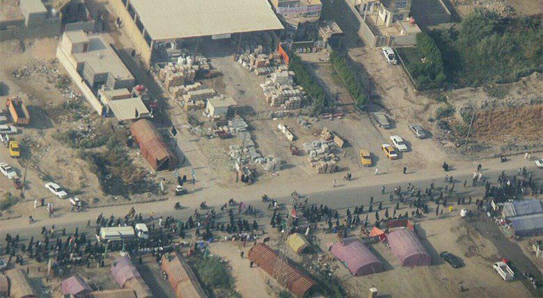 تصویر گزارش تصویری ـ تصاویر هوایی از پیاده روی زائران اربعین حسینی از نقاط مختلف عراق به سوی شهر مقدس کربلا