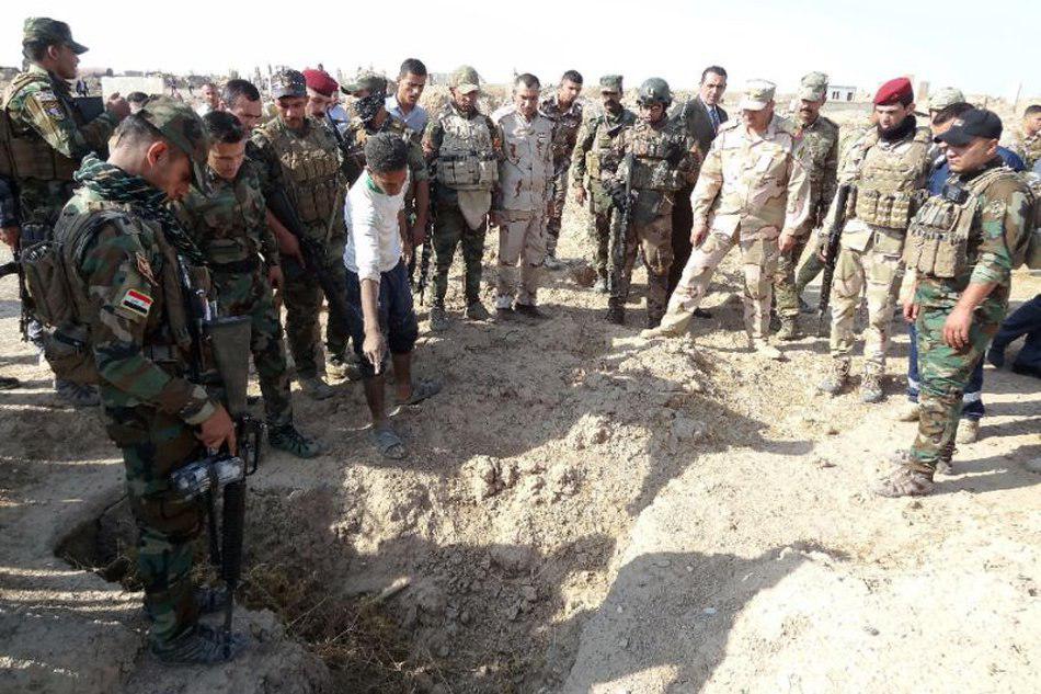 تصویر کشف یک گور جمعی در عراق