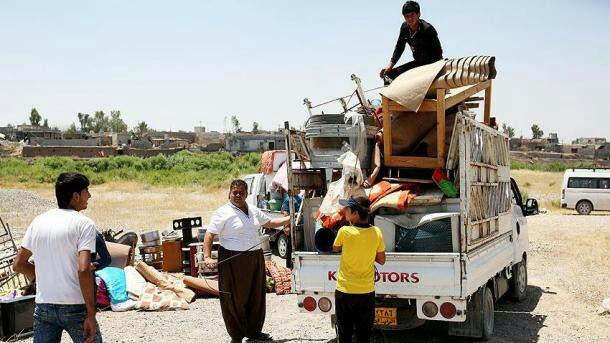 تصویر بازگشت هزاران خانواده آواره عراقی به شهرهای آزاد شده