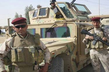 تصویر کشف سلاح و تجهیزات جنگی متعلق به داعش در بغداد