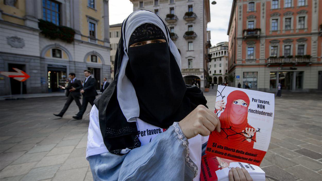 تصویر ممنوع شدن پوشیدن برقع در یک منطقه دیگر «سوئیس»