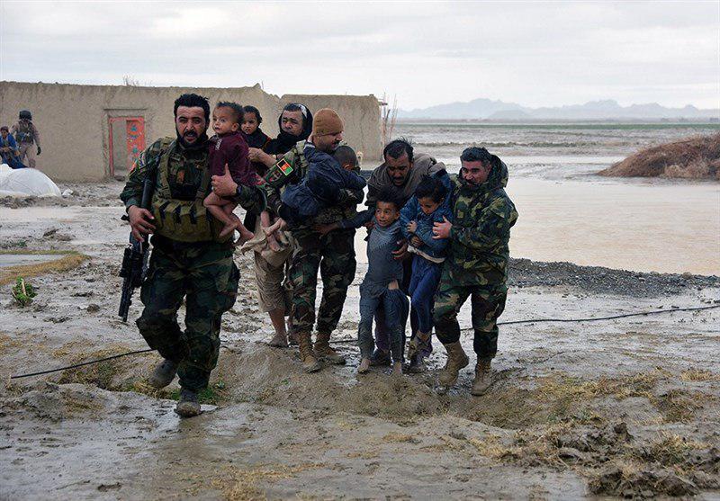 تصویر سیلاب، برف و باران جان ده ها تن را در افغانستان گرفت