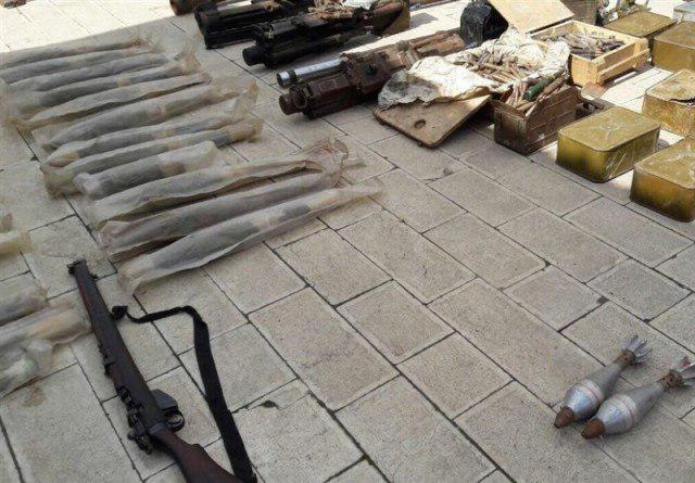 تصویر کشف انبار تسلیحاتی عناصر داعش در حومه دمشق