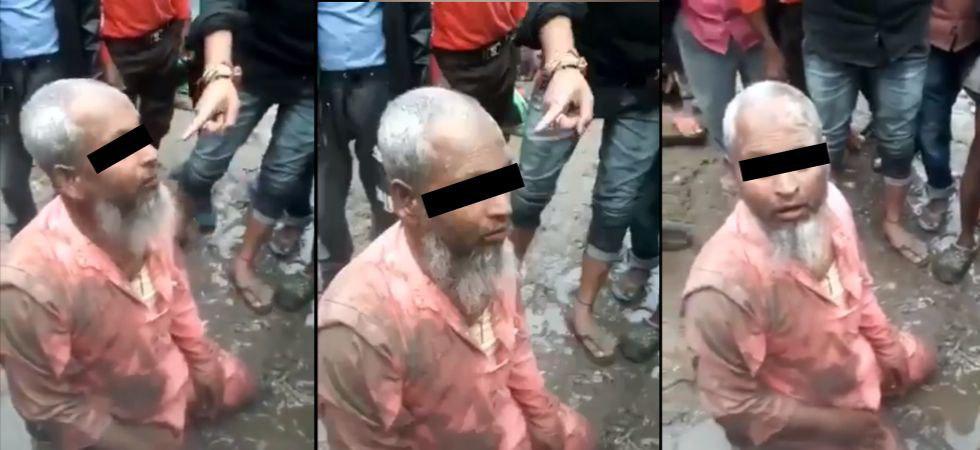 تصویر حمله به مرد مسلمان در ایالت آسام هند، به خاطر فروش گوشت گاو