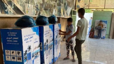 تصویر توزیع کولرهای آبی میان نیازمندان شهر مقدس کربلا توسط موسسه حضرت ام البنین سلام الله
