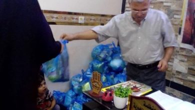 تصویر توزیع بسته های معیشتی میان نیازمندان بغداد به مناسبت ایام شهادت حضرت زهرا سلام الله علیها